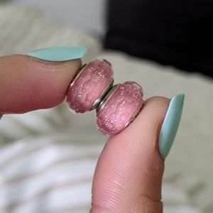 Two pink Murano glass Pandora charms